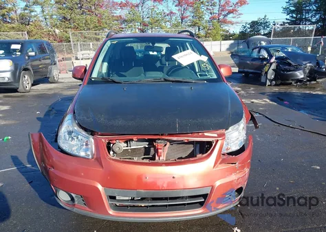 2009 Suzuki Sx4 Technology z USA, uszkodzony, nr VIN JS2YB413895100110